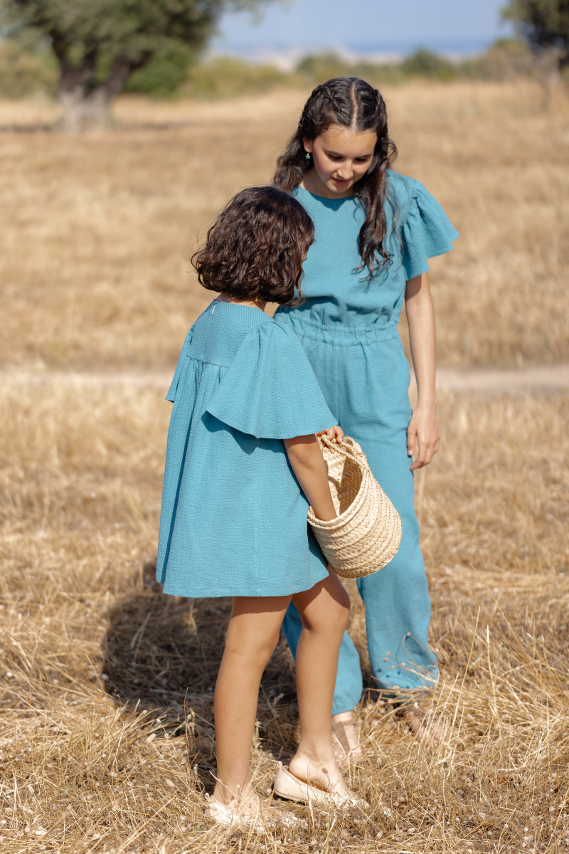 MON01 Mono largo alitas aguamarina