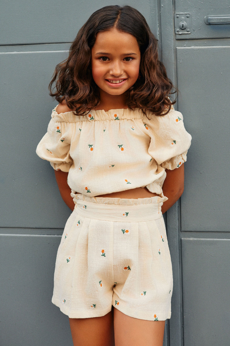 Top manga farol bordado margaritas