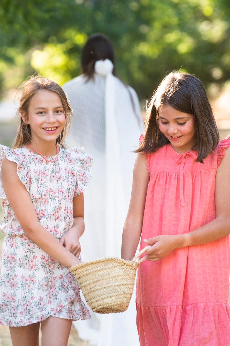 BLU04 Blusa volantes laterales flores coral