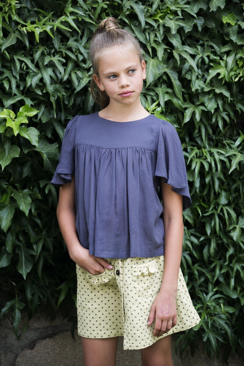 FAL03 Falda abotonada bolsillos estrellitas amarilla