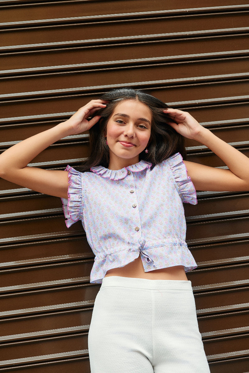 Blusa abotonada flor india