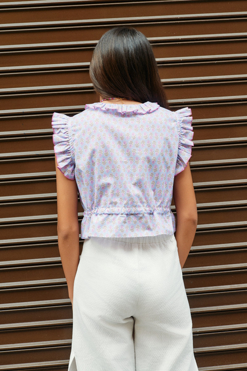 Blusa abotonada flor india