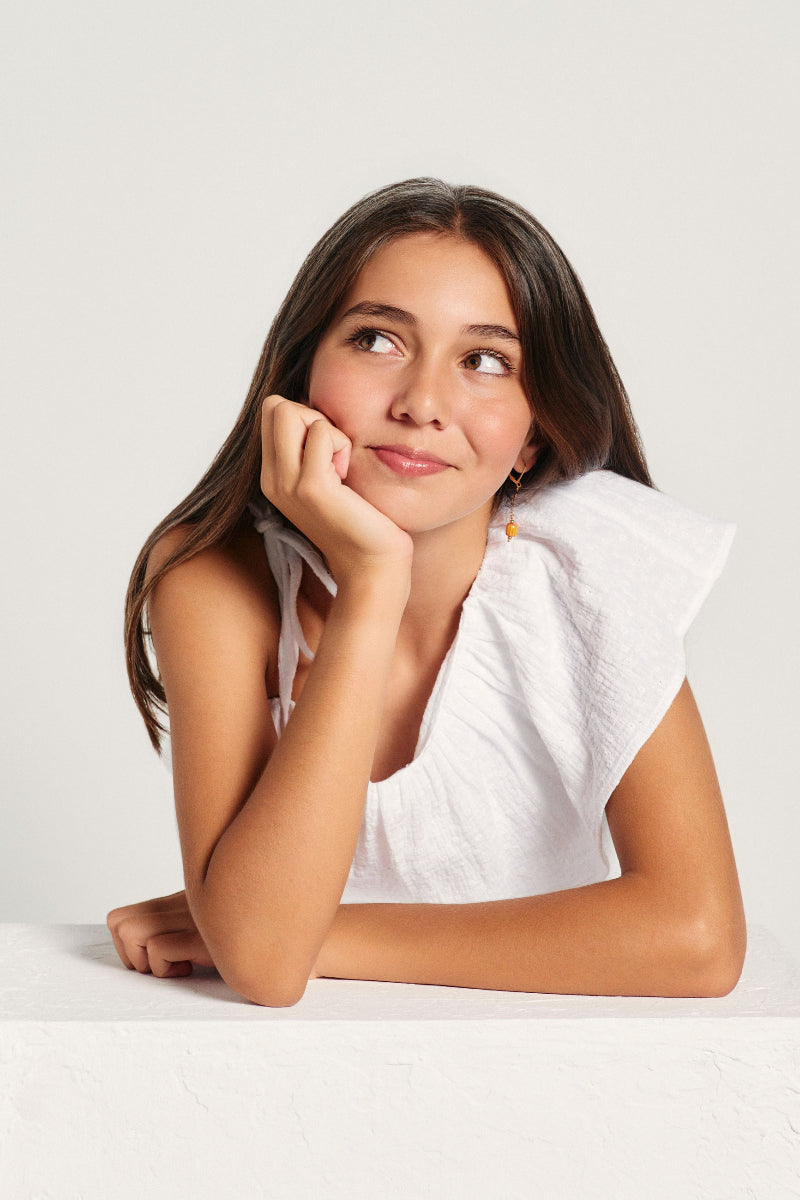 Blusa asimétrica volante bordado blanca