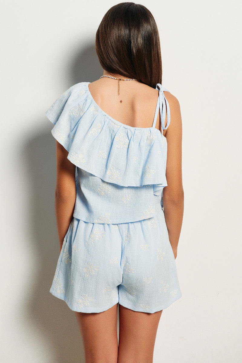 Blusa asimétrica volante bordado ramas