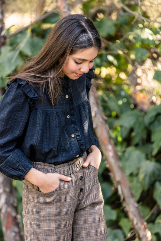 BLU11 Blusa volantes negra
