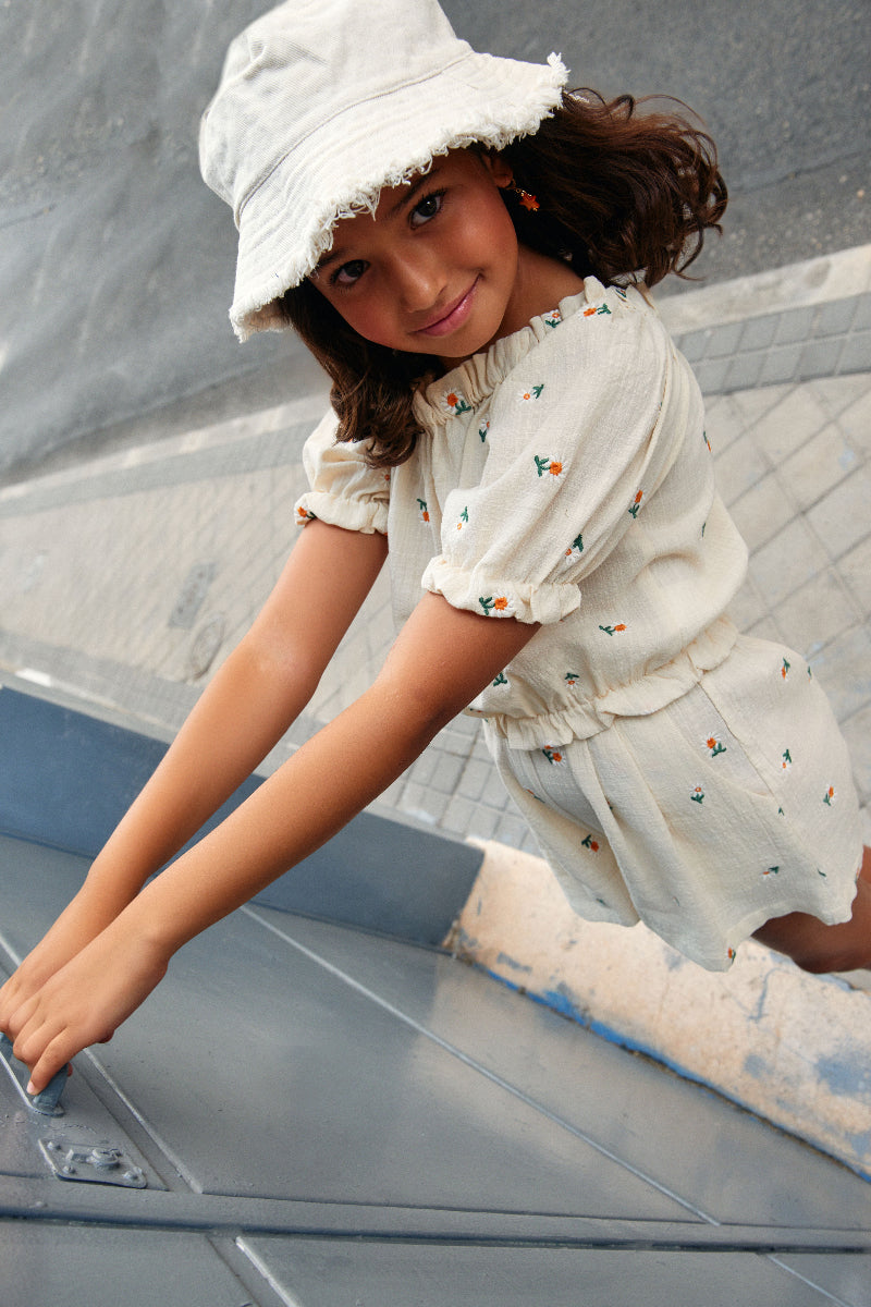 Top manga farol bordado margaritas