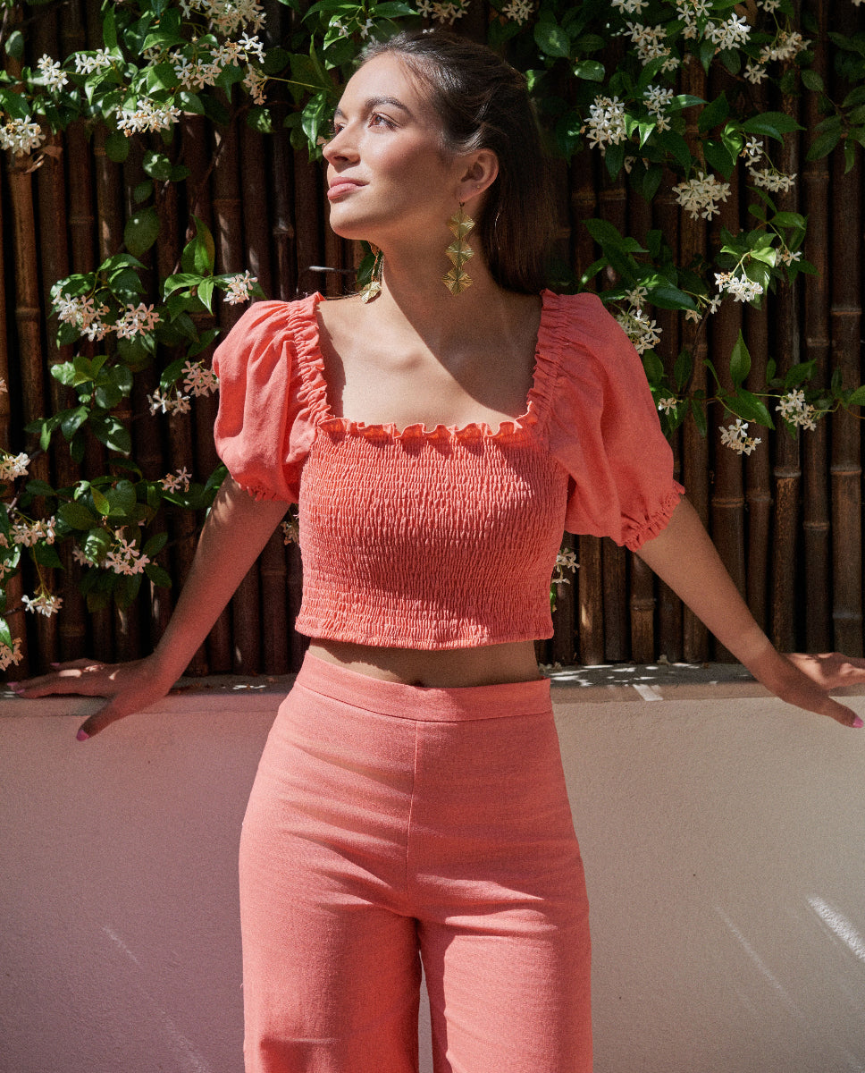 Blusa abullonada engomada coral